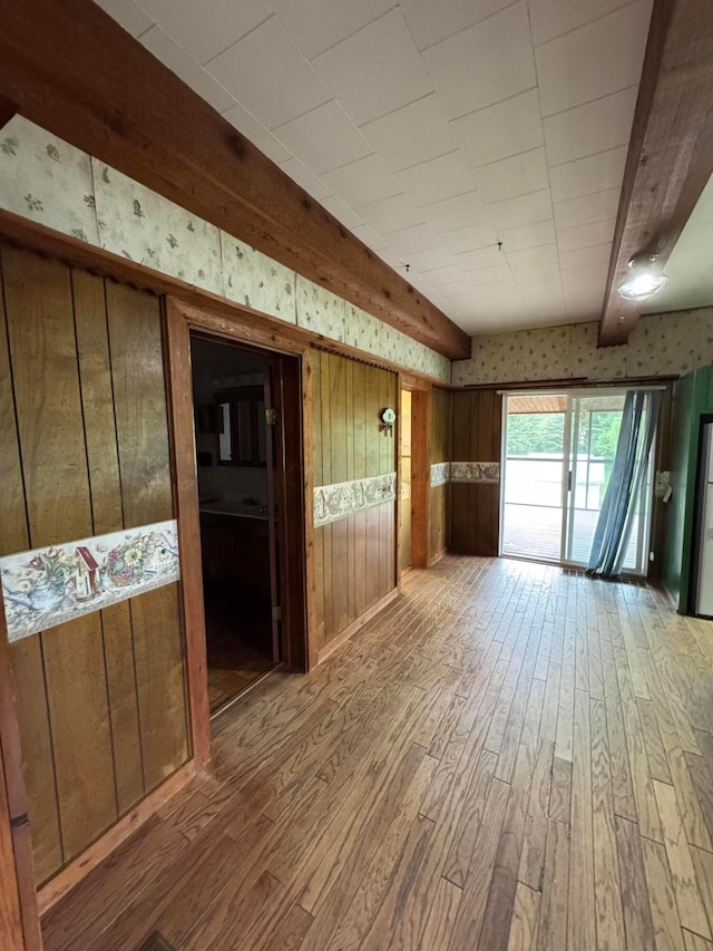 627 N Main St, Utica, OH 43080 - unfurnished room with hardwood / wood-style flooring and wood walls