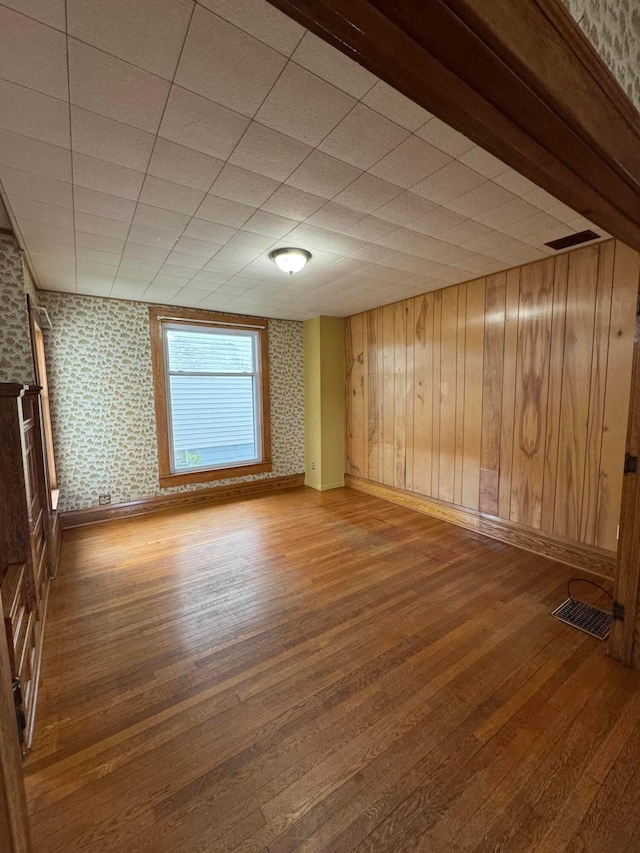 627 N Main St, Utica, OH 43080 - empty room featuring wood finished floors and baseboards