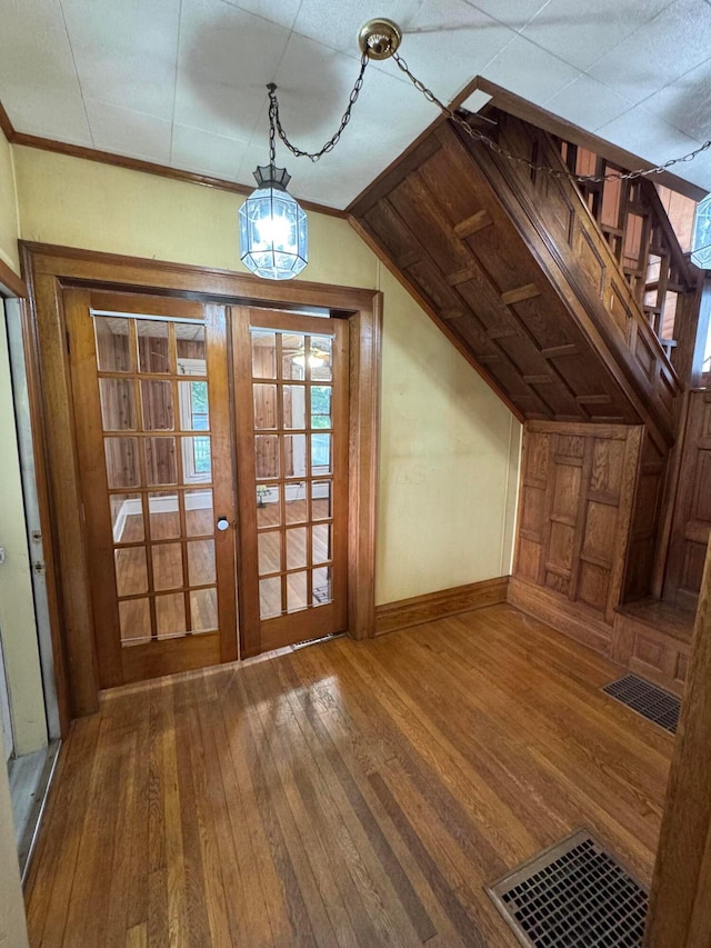 627 N Main St, Utica, OH 43080 - additional living space with wood-type flooring, baseboards, and french doors