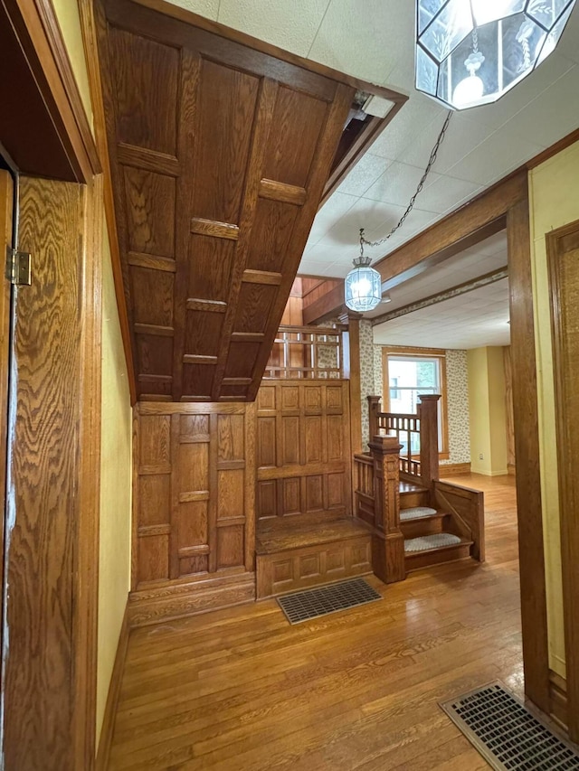 627 N Main St, Utica, OH 43080 - stairs with wood finished floors and wooden walls