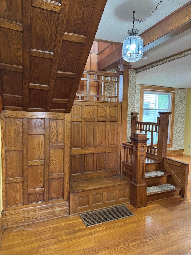 627 N Main St, Utica, OH 43080 - detailed view of wood finished floors, beamed ceiling, and wooden walls
