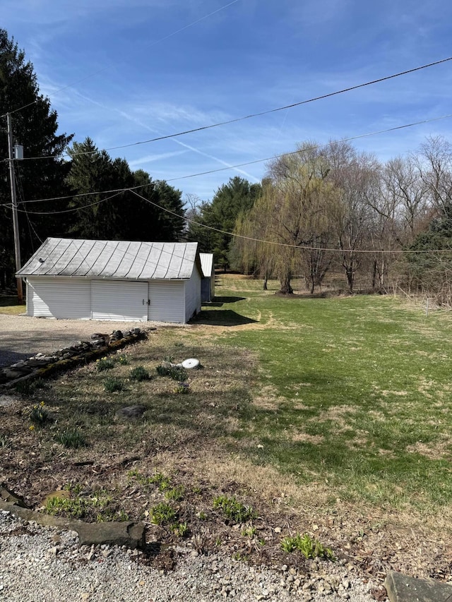 627 N Main St, Utica, OH 43080 - view of grassy yard featuring an outbuilding