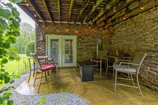 15027 King Rd, Howard, OH 43028 - view of patio featuring french doors and outdoor dining area