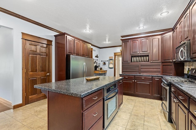 15027 King Rd, Howard, OH 43028 - kitchen with appliances with stainless steel finishes, ornamental molding, a center island, baseboards, and light tile patterned floors