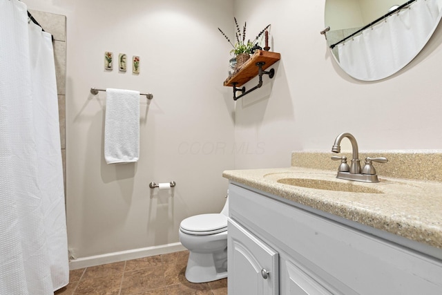 15027 King Rd, Howard, OH 43028 - bathroom with vanity, toilet, a shower with curtain, and baseboards