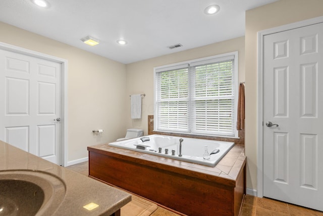 15027 King Rd, Howard, OH 43028 - full bathroom featuring a bath, vanity, recessed lighting, and baseboards