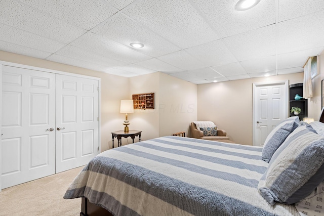 15027 King Rd, Howard, OH 43028 - bedroom featuring carpet, a drop ceiling, and a closet