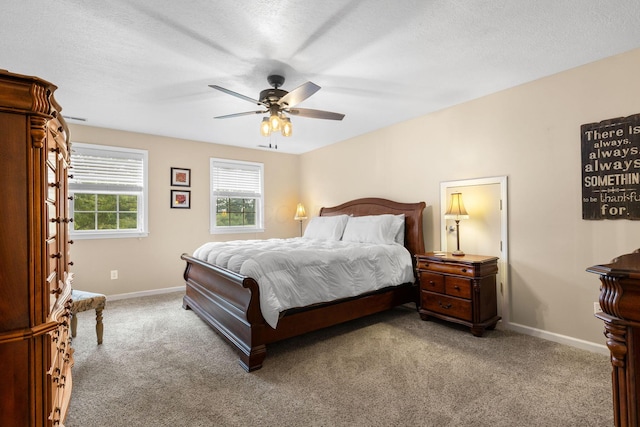 15027 King Rd, Howard, OH 43028 - bedroom featuring carpet flooring, baseboards, a ceiling fan, and a textured ceiling