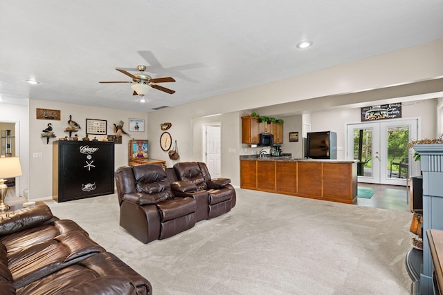 15027 King Rd, Howard, OH 43028 - living area featuring a ceiling fan, french doors, light carpet, and recessed lighting