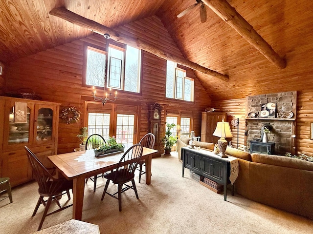 15626 Pleasant View Dr, Mount Vernon, OH 43050 - dining space featuring wood ceiling with exposed beams, high vaulted ceiling, light colored carpet, rustic walls, and a chandelier