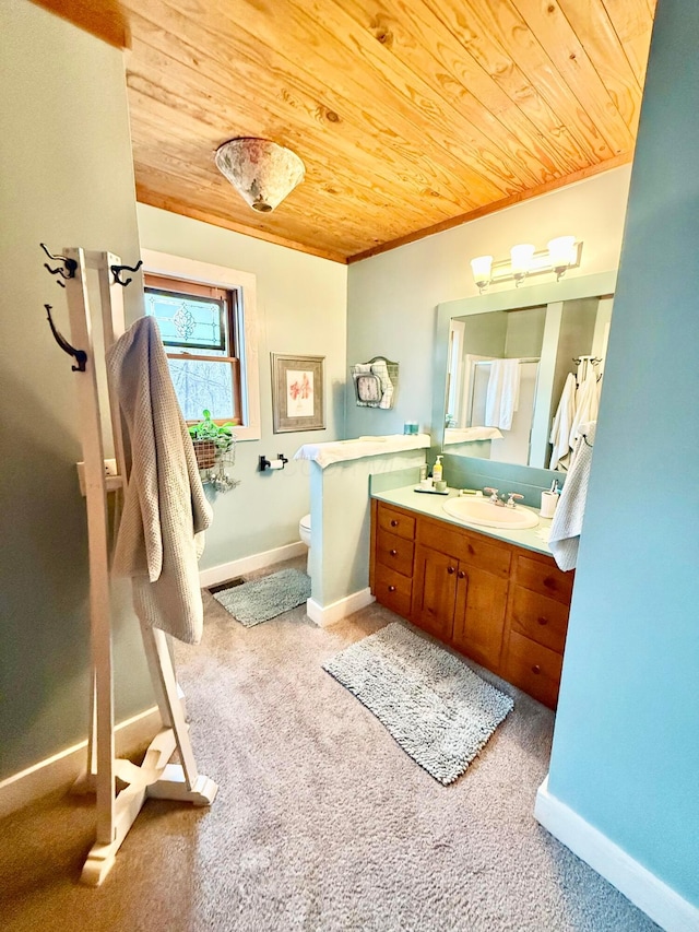 15626 Pleasant View Dr, Mount Vernon, OH 43050 - bathroom featuring wood ceiling, vanity, toilet, baseboards, and ornamental molding