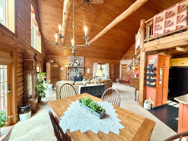 15626 Pleasant View Dr, Mount Vernon, OH 43050 - dining space featuring high vaulted ceiling, log walls, plenty of natural light, wood ceiling, and dark carpet