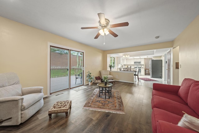 4129 Leitrim Ct, Dublin, OH 43016 - living room featuring ceiling fan and dark wood-style flooring
