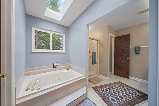 4129 Leitrim Ct, Dublin, OH 43016 - bathroom with a skylight, a tub with jets, and a shower stall