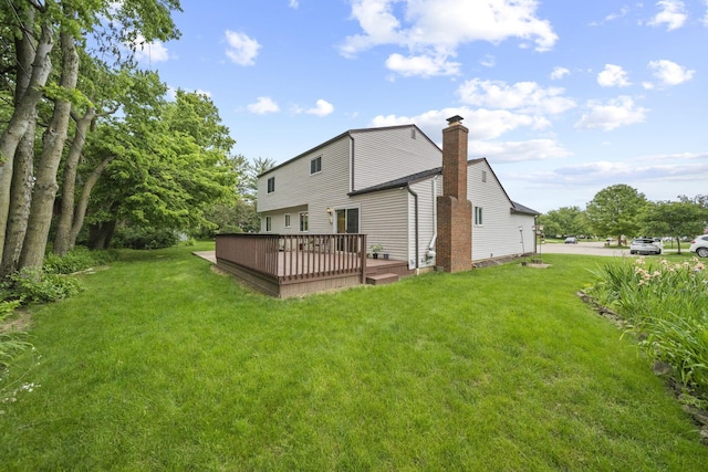 4129 Leitrim Ct, Dublin, OH 43016 - back of house featuring a deck, a chimney, and a yard