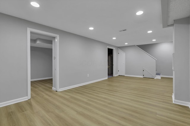 4230 Reed Rd, Columbus, OH 43220 - below grade area with recessed lighting, light wood-style flooring, and baseboards