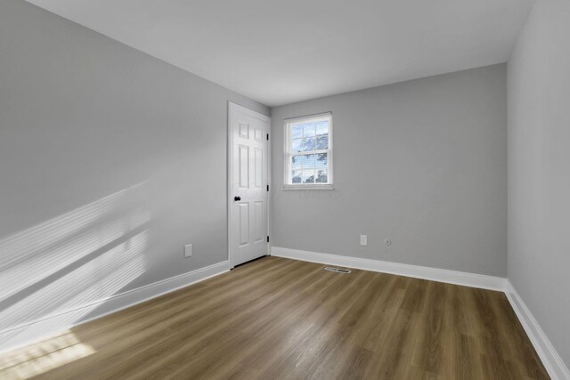 4230 Reed Rd, Columbus, OH 43220 - spare room with wood finished floors and baseboards
