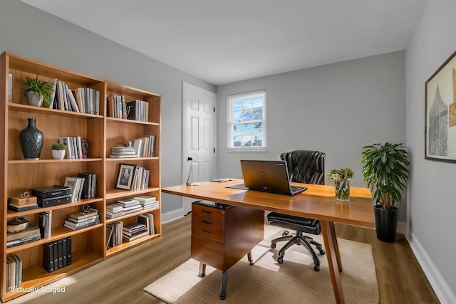 4230 Reed Rd, Columbus, OH 43220 - office area with wood finished floors and baseboards