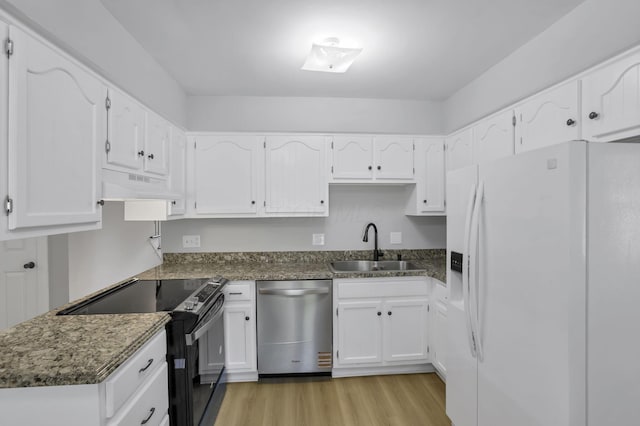 4230 Reed Rd, Columbus, OH 43220 - kitchen featuring white fridge with ice dispenser, stainless steel dishwasher, electric range, under cabinet range hood, and a sink