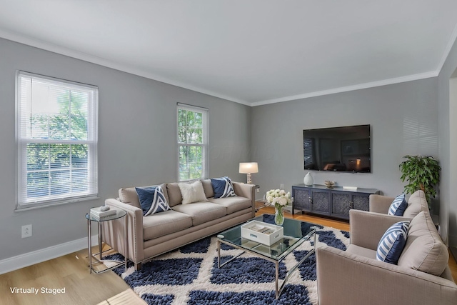 4230 Reed Rd, Columbus, OH 43220 - living area featuring light wood-style floors, baseboards, and crown molding
