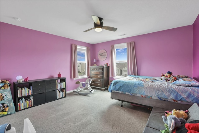 233 Dowler Dr, South Bloomfield, OH 43103 - bedroom with carpet, ceiling fan, and baseboards