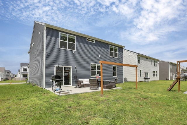 233 Dowler Dr, South Bloomfield, OH 43103 - rear view of house with an outdoor living space, a patio area, and a lawn