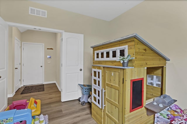 233 Dowler Dr, South Bloomfield, OH 43103 - rec room with wood finished floors