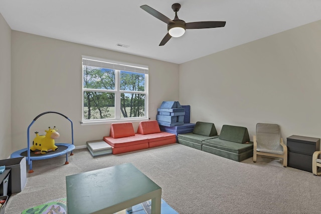 233 Dowler Dr, South Bloomfield, OH 43103 - rec room featuring carpet floors, a ceiling fan, and baseboards
