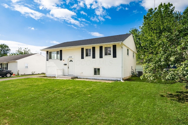 4795 Hafey Ave, Columbus, OH 43228 - bi-level home featuring central AC unit and a front yard