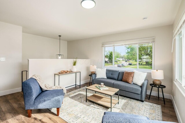 4795 Hafey Ave, Columbus, OH 43228 - living area featuring wood finished floors, healthy amount of natural light, and baseboards