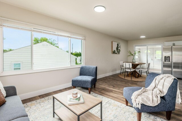 4795 Hafey Ave, Columbus, OH 43228 - living area with baseboards, healthy amount of natural light, wood finished floors, and recessed lighting