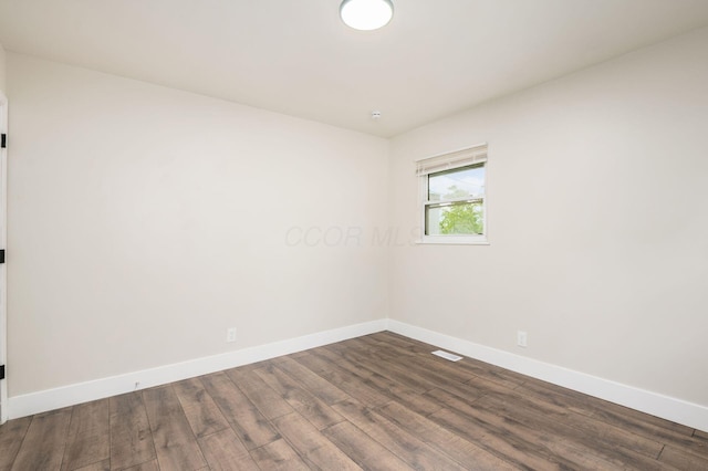 4795 Hafey Ave, Columbus, OH 43228 - spare room featuring baseboards and wood finished floors
