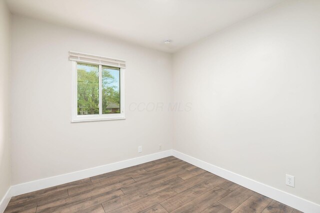 4795 Hafey Ave, Columbus, OH 43228 - empty room featuring baseboards and dark wood finished floors
