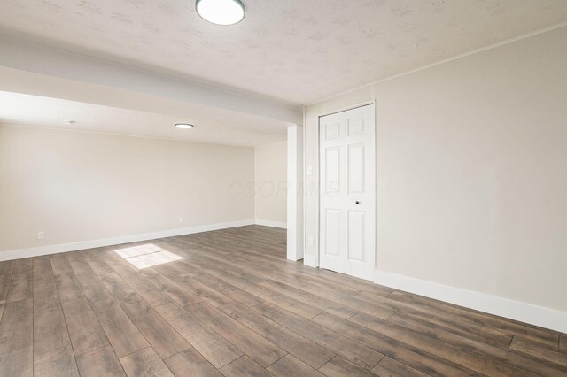 4795 Hafey Ave, Columbus, OH 43228 - empty room with dark wood-style flooring and baseboards