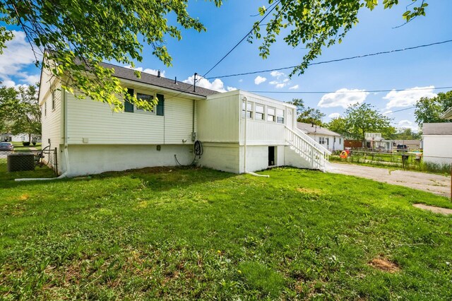 4795 Hafey Ave, Columbus, OH 43228 - rear view of property with central AC unit