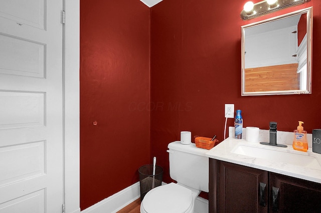 113 E Channel St, Newark, OH 43055 - half bathroom with toilet, vanity, and baseboards