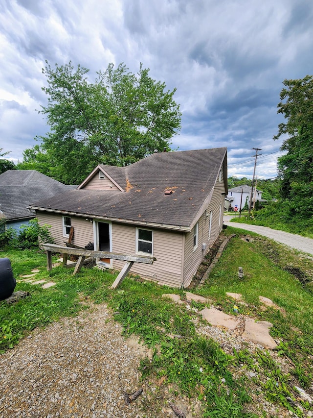 750 S 9th St, Cambridge, OH 43725 - view of front of property featuring roof with shingles