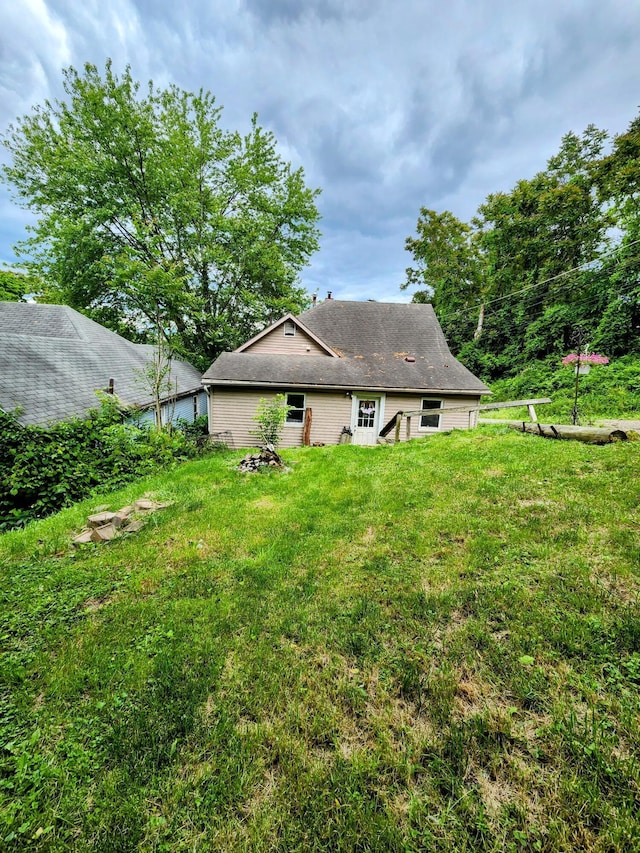 750 S 9th St, Cambridge, OH 43725 - back of house with a lawn