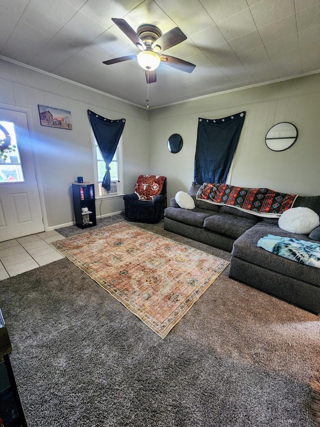 750 S 9th St, Cambridge, OH 43725 - living room with carpet floors, ornamental molding, a ceiling fan, and tile patterned flooring