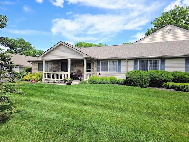 154 Pioneer Cir, Pickerington, OH 43147 - single story home with a porch, a front yard, and stone siding
