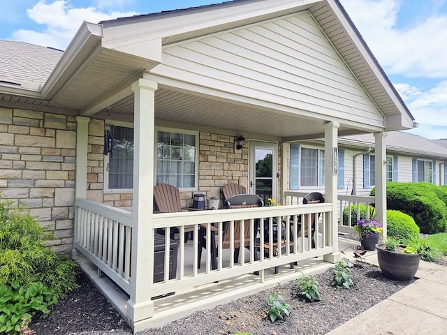 154 Pioneer Cir, Pickerington, OH 43147 - entrance to property featuring stone siding and covered porch