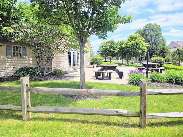 154 Pioneer Cir, Pickerington, OH 43147 - surrounding community featuring a patio and a yard