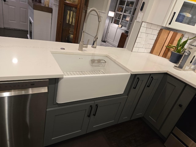 154 Pioneer Cir, Pickerington, OH 43147 - kitchen with dishwasher, a sink, white microwave, backsplash, and light countertops