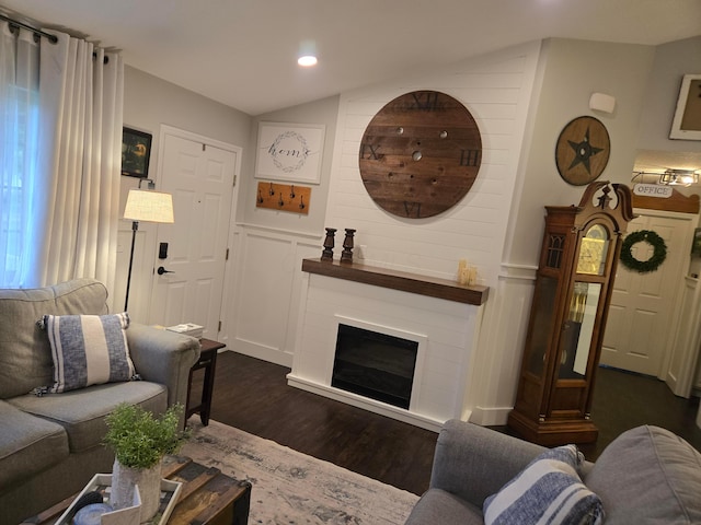 154 Pioneer Cir, Pickerington, OH 43147 - living room with dark wood-type flooring, recessed lighting, a decorative wall, wainscoting, and a glass covered fireplace