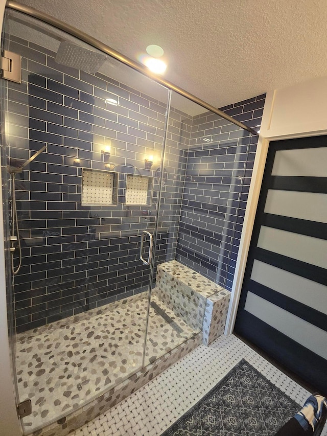 154 Pioneer Cir, Pickerington, OH 43147 - bathroom featuring a textured ceiling and a stall shower