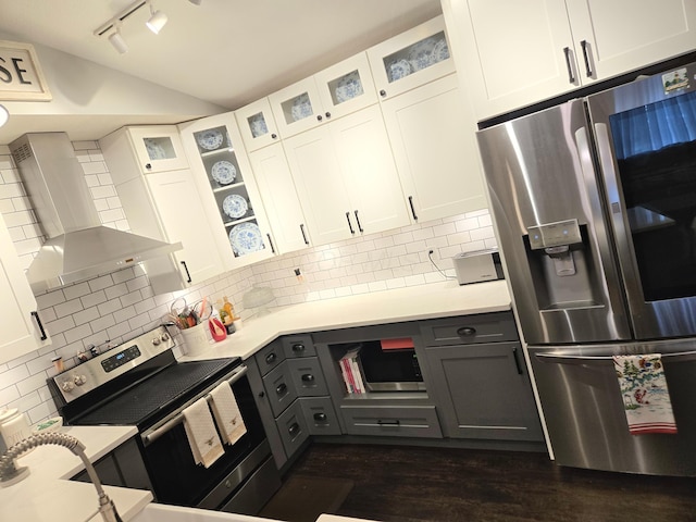 154 Pioneer Cir, Pickerington, OH 43147 - kitchen featuring stainless steel appliances, wall chimney range hood, lofted ceiling, white cabinets, and rail lighting