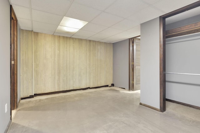 2320 Miller Paul Rd, Galena, OH 43021 - finished basement with wooden walls, a paneled ceiling, and baseboards