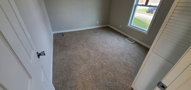 16 W Walnut St, Jeffersonville, OH 43128 - carpeted empty room with baseboards