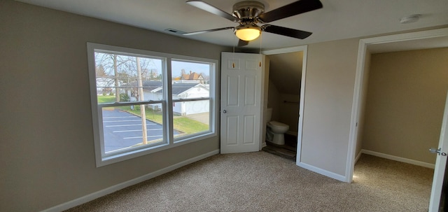 16 W Walnut St, Jeffersonville, OH 43128 - unfurnished bedroom with light colored carpet, baseboards, and a ceiling fan