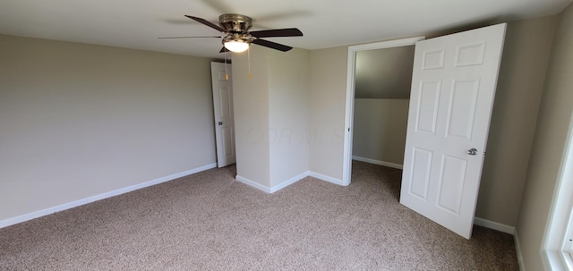 16 W Walnut St, Jeffersonville, OH 43128 - unfurnished bedroom with carpet floors, baseboards, and ceiling fan